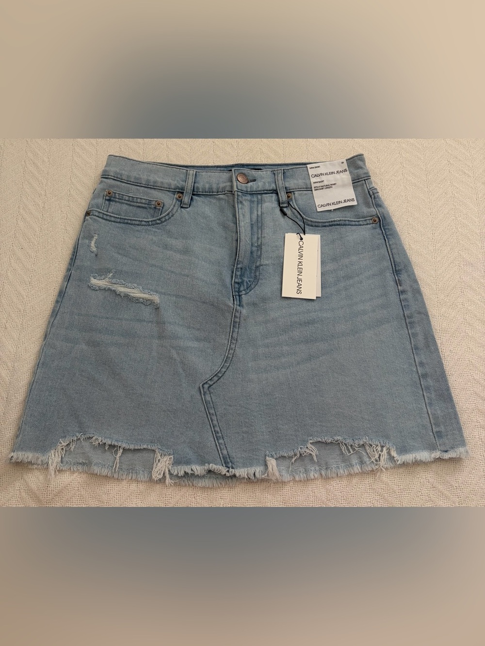 Calvin Klein Women’s Jeans Light Blue Distressed Denim Mini Skirt